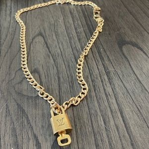 Authentic Louis Vuitton lock and key with a chein #312
